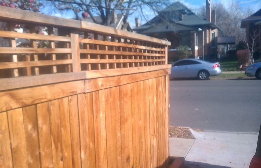 Privacy fence with a lattice topper