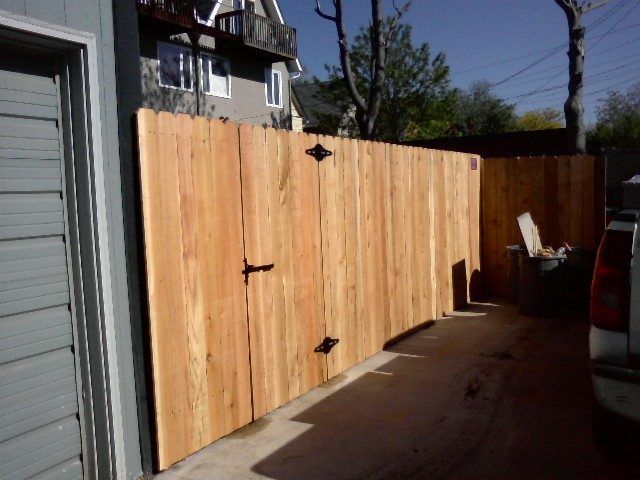 Tall side-yard fence and gate